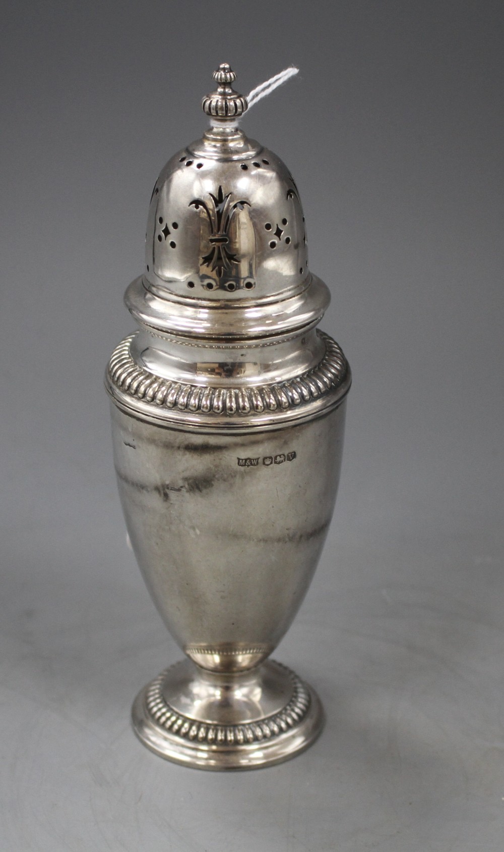 A George VI silver sugar caster by Mappin & Webb, Sheffield, 1938, 18.6cm, 5 oz.